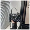 Bolso Kelly para Mujer 2026 Nuevo Estilo Moda Tendencia Lunares Pequeño Bolso de Mano Superior Textura de Alta Calidad Elegante Bolso de Hombro Único Cruzado