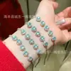 Atacado de fábrica pequeno vermelho departamento material perigoso natural jadeíte água azul pulseira de açúcar s925 prata incrustado design pequeno fresco