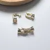 Hebilla de cierre de botón con incrustaciones de diamantes chapada en oro de 18 quilates que conserva el color hebilla de cabeza de hebilla hebilla universal hebilla diy accesorios de corindón rojo de cristal