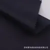 Tejido especial para bolsas de exterior, hecho de nailon totalmente reciclado con tres compartimentos, ligero, lavable, resistente al desgarro, libre de flúor e impermeable.