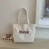 Bolsa Tote de Ombro Grande Capacidade Estilo Coreano Estilo Preguiçoso 2026 Primavera Nova Tendência Fresca e Estilosa Bolsa de Compras de Lona