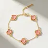 Pulseira de cristal flor de quatro pétalas para comércio exterior transfronteiriço, versão coreana, luxo leve, design de alta qualidade, acessório de mão floral estilo ins