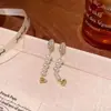 Pendientes Brillantes de Diamantes Retro Estilo Francés de Lujo Ligero para Socialité, Borla Larga de Perlas de Gama Alta de Nicho, Temperamento Versátil
