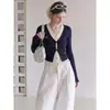 Nuevo top de otoño para mujer, corte ajustado, manga larga, con diseño de imitación de dos piezas, colores contrastantes, en azul marino