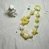 Mismo Estilo del Libro Rojo Nido de Pájaro Lazo Estrella de Cinco Puntas Hecho a Mano con Cuentas Hebilla para Teléfono Móvil Colgante para Maleta Colgante para Llave Hebilla Redonda