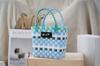 Cesta de verduras con diseño de tablero de ajedrez tejida a mano, bolso de mano para mujer, cesta de picnic, accesorios para fotografía, bolso de mano de marca de moda al por mayor