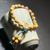 Pulseira de Cabacinha Esculpida Estilo Étnico com Pingente de Cabacinha Colorido e Contas de Abóbora Atacado