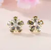 Brincos de flor de cinco pétalas, best-seller transfronteiriço, brincos de pétalas vazadas com diamantes, joias frescas e jovens estilo coreano, atacado
