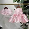 Vestido vermelho estilo francês para meninas 2026 novo modelo simples liso laço elegante vestido de princesa fornecimento transfronteiriço