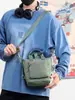 Mochila Pequeña Multifuncional Casual para Hombre Bolso Cruzado Versátil de Personalidad Moderno Bolso Cuadrado de Mano de un Solo Hombro para Mujer
