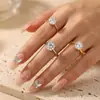 Anillo de Acero de Titanio con Zirconia, Diseño de Seis Garras, Ocho Corazones y Ocho Flechas para Mujer, Anillo de Compromiso y Boda Sencillo y Elegante, Diseño de Nicho