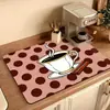 Nueva alfombrilla de secado para cocina hecha de tierra de diatomeas, absorbente y de secado rápido, adecuada para tazas, mesa de té, cafetera y como alfombrilla protectora aislante para escritorio, disponible para venta al por mayor