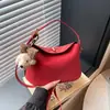 Bolsa pequena de mão com textura de comércio exterior retrô feminina 2026 nova de nicho moderna de ombro único transversal