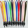 Cordón para teléfono móvil con hebilla dos en uno, largo y ancho, de tela, con estampado de dibujos animados y varias imágenes, disponible en stock.
