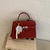 2026 Nova Bolsa da Moda Tendência com Fivela de Cadeado Texturizada Estilo Ins Bolsa Quadrada Pequena para Mulheres Primavera e Verão Bolsa Transversal Artística Estilosa