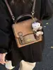 Bolsas Femininas Transfronteiriças Outono e Inverno 2026 Bolsas de Luxo Bolsas de Mão de Nicho Mochilas de Nova Moda Bolsas Quadradas Pequenas