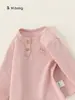 Ropa para niños Bangxuan nueva colección de otoño color liso cuello redondo camiseta interior base para bebé algodón suave top de manga larga para bebé