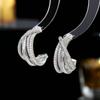 Pendientes de aguja de plata s925 al por mayor, pendientes de circonita de colores, diseño moderno de nicho, líneas geométricas con sentido, pendientes de aro con cruz en forma de C.