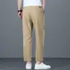 Pantalones casuales de corte alto para hombre de alta gama, pantalones rectos anchos finos de verano 2026 para hombre, pantalones de 9 puntos para hombres menudos