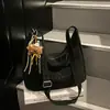 Bolso Versátil Diario para Mujer 2025 Nuevo Otoño e Invierno Versátil Retro Gran Capacidad Moda Nicho Hombro Cruzado Bolso Tote