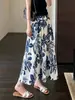 Saia Estampada Estilo Retrô Francês de Qualidade Linha A Cintura Alta Emagrecedora para Mulheres Novo Estilo Primavera e Verão 2026 H042420