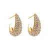 Moda europea y americana diseño de nicho aretes de luna en forma de C de acero inoxidable lujo ligero totalmente incrustados con diamantes de colores aretes de guisante en forma de C