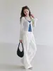 Camiseta blanca fina de manga larga semi-transparente con protección solar para mujer, nuevo conjunto de dos piezas slim-fit de verano 2026