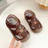 Sandalias Infantiles Abiertas Caladas 2026 Primavera/Verano Florales Zapatos de Princesa para Niñas Estilo Campestre Suela Suave Zapatos de Cuero para Bebé