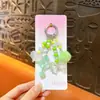 Llavero colgante de muñeca pequeña creativa, colgante de mochila lindo estilo Miu, llavero de accesorios pequeños para DIY al por mayor