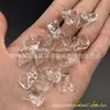 Al por mayor acrílico cuatro en uno agujero horizontal piedra transparente irregular hielo DIY accesorios para prendas de vestir bolso decoración de bolsa