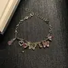 Pulsera de Violín con Mariposa Vintage