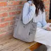 Nova bolsa tote simples de grande capacidade transfronteiriça, bolsa de mão casual e moderna, bolsa de ombro versátil para trabalho e deslocamento