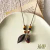 Collar colgante estilo étnico bohemio para mujer, nuevo modelo 2026, diseño de nicho al por mayor, accesorio largo estilo chino nuevo