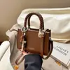 Bolso de Mano Pequeño Nuevo Otoño e Invierno 2025 Transfronterizo para Mujer, Bolso Cuadrado Pequeño Versátil Casual para Hombro, Bolso Cruzado Simple para Viajes