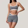 Conjunto de top e shorts de ginástica e ioga sexy colado, europeu e americano, para corrida e esportes ao ar livre, conjunto de duas peças