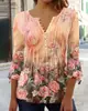 Camiseta básica de manga corta con cuello en V y botones plisados para mujer, moda europea y americana transfronteriza de primavera y verano de 2023