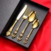 Cuchara y tenedor de acero inoxidable 304 transfronterizo repujado estilo europeo corte imperial vajilla Golden Court chapada en titanio juego de cuchillo, tenedor y cuchara de estilo occidental