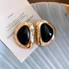 Pendientes geométricos irregulares de resina con aguja de plata transfronterizos europeos y americanos, pendientes de diseño nicho, accesorios elegantes de lujo ligero de alta gama