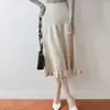 Falda de 100% lana pura con dobladillo con volantes para mujer, nuevo estilo otoño e invierno, cintura alta elástica, que cubre la cadera, tejida, de longitud media, plisada