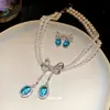 Sombra de Mariposa de Cristal Azul~Collar y Pendientes con Lazo de Zircón Perlado de Doble Capa, Cadena para Clavícula de Estilo Palaciego de Alta Gama para Mujer