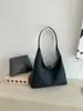 Bolsa grande listrada casual transfronteiriça feminina nova estilosa simples tote bag grande capacidade versátil para o dia a dia bolsa de ombro único moderna