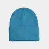 Gorro cálido de otoño e invierno, gorro de punto brillante para hombres y mujeres, gorro de acrílico a prueba de viento, gorro de lana engrosado con protección para las orejas, más LOGOTIPO