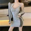 Conjunto de Roupa Feminina Sexy e Fashion 2026 Outono Novo Casaco de Manga Longa Top Saia Bodycon Justa Conjunto de Duas Peças