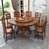 Mesa de comedor redonda de madera maciza estilo chino, adecuada para uso doméstico, con placa de inducción integrada y bandeja giratoria, también disponible como mesa de comedor redonda tallada estilo hotel