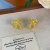 Pendientes de Aro Hueco Super Brillantes Nicho Lujo Ligero Diseño de Alta Gama Pendientes Irregulares Moda Temperamento Pendientes