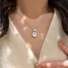 Libro Rojo Pequeño Explosiones Copo de Nieve Cepillado Botón de Paz Collar para Mujer 2024 Nuevo Lujo Ligero Colgante Avanzado