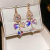 Pendientes de Borla con Forma de Flor de Abanico Incrustados con Circonita de Diamante Transfronterizos Europeos y Americanos, Lujo Ligero, Pendientes de Gama Alta, Diseño de Nicho