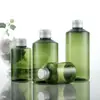 Em estoque 50-200ml frasco de ombro verde escuro com tampa de alumínio frasco secundário loção de orvalho puro embalagem secundária frasco de plástico fábrica atacado