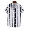 311# Popular Vestido de la Isla de Hainan Camisa de Playa Sanya Melocotón Hawái Casual Camisa de Pareja para Hombres y Mujeres