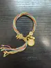 Pulsera estilo Tíbet, cordón de thangka, pulsera de oración de templo, estilo étnico, colgante de los Cinco Dioses de la Riqueza, pulsera tejida a mano, venta al por mayor